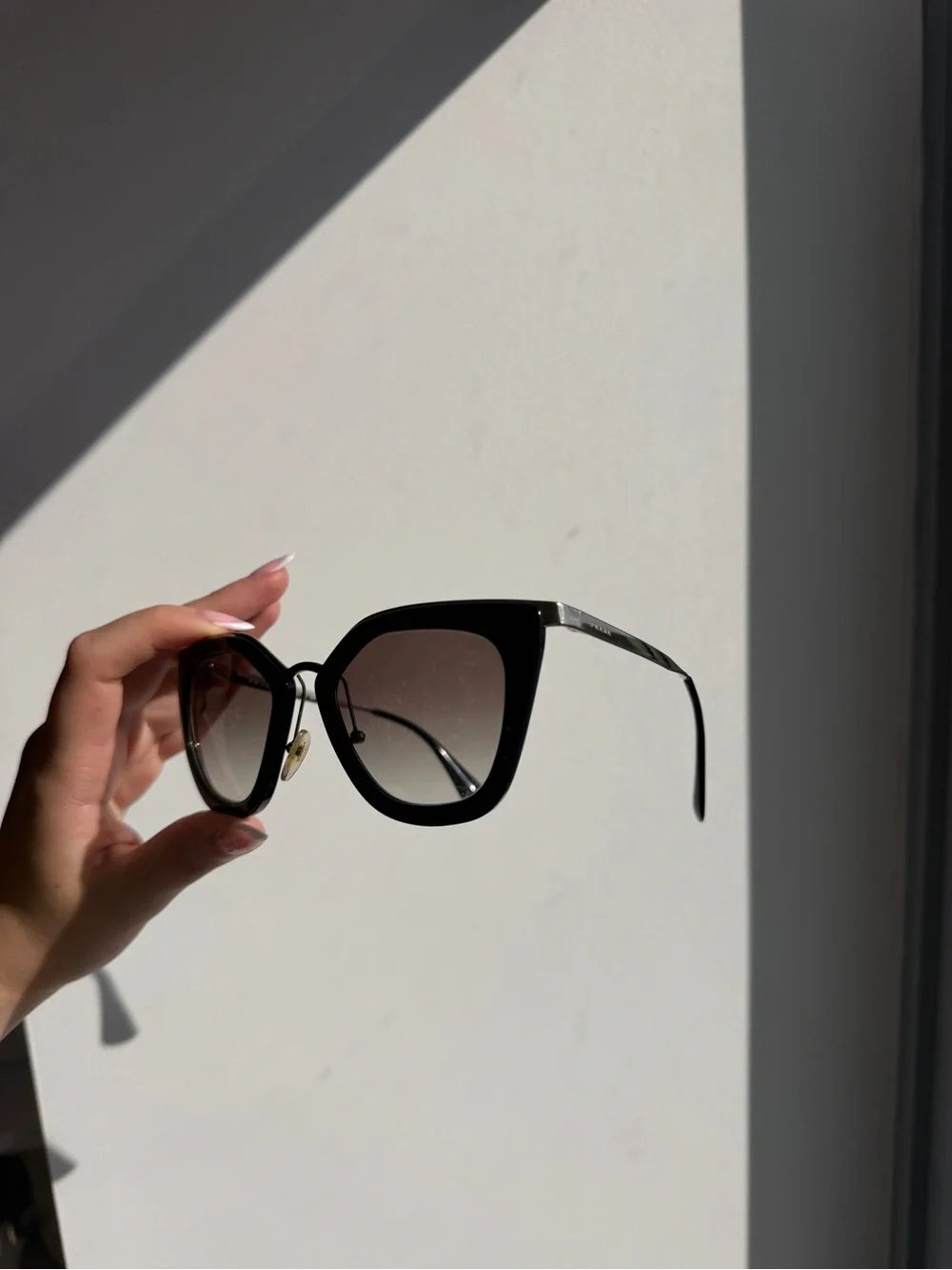 Prada Black Cat-Eye Sunglasses with Gradient Lenses